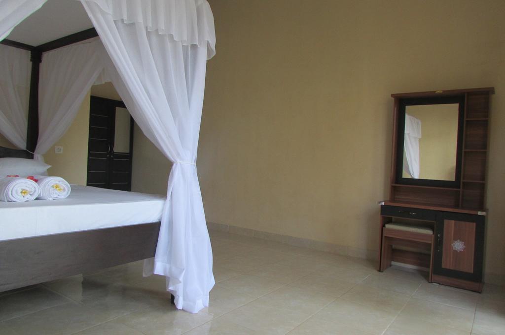 Warung Jemeluk & Home Stay Amed Quarto foto